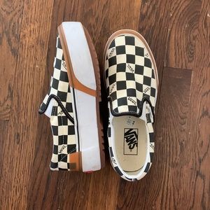 Black and white checkers platform slip on vans